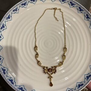 Elegant Gold and Brown Necklace